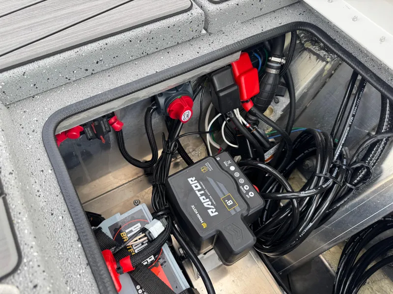 Slide: The Image of 2025 Vexus ACX 2210 boat wiring compartment with Raptor control system. - 49