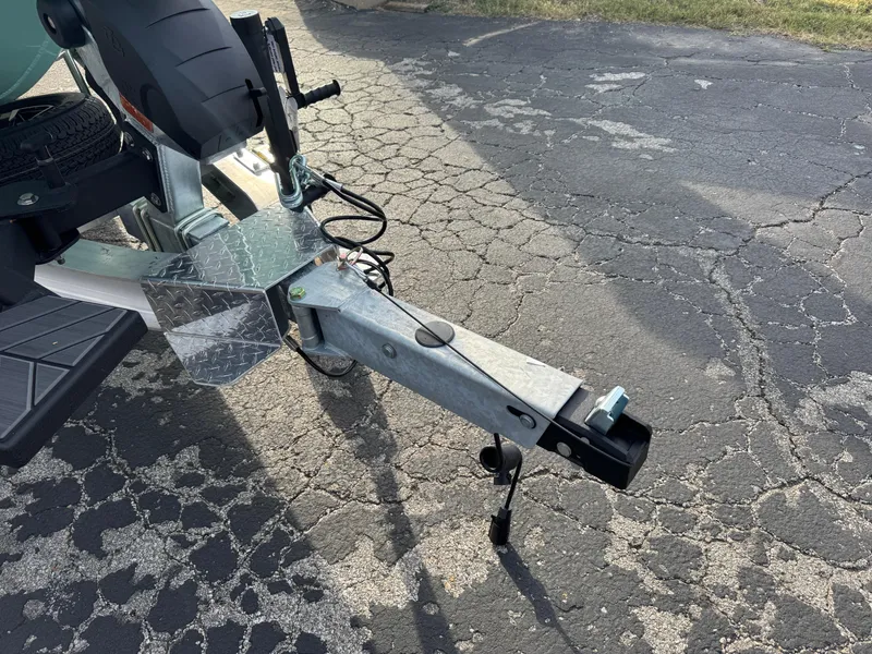 Slide: The Image of 2025 Vexus ACX 2210 trailer hitch on cracked asphalt pavement. - 5