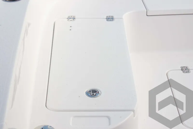 Slide: The Image of 2025 Caymas 26 HB boat deck with storage compartment. - 26