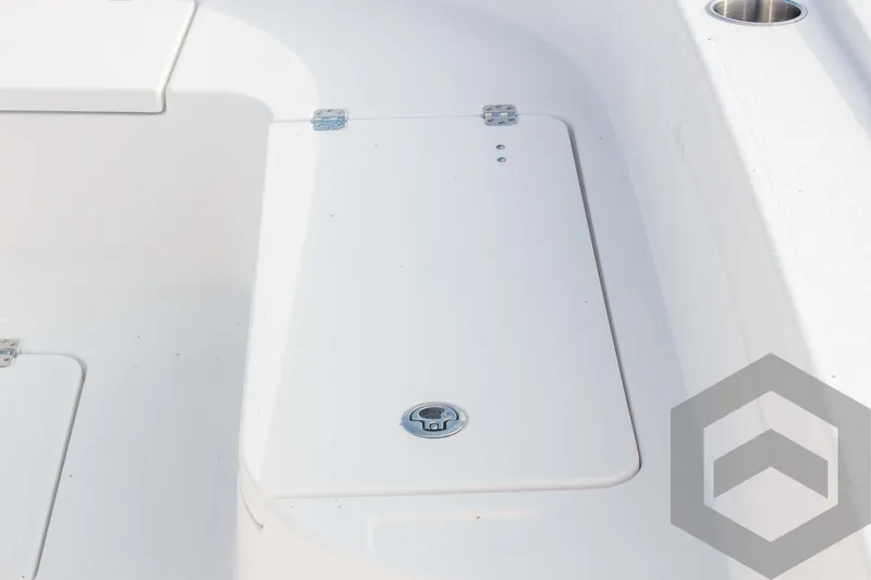 Slide: The Image of 2025 Caymas 26 HB boat deck with storage compartment. - 27