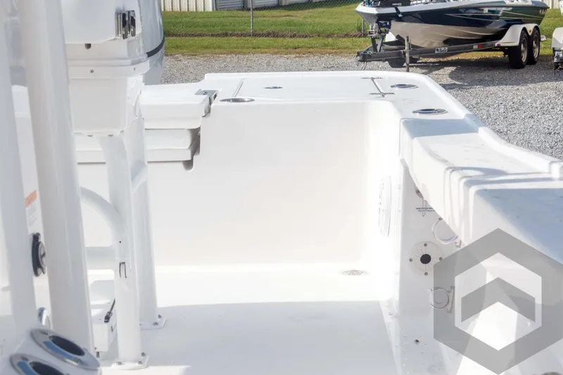 Slide: The Image of 2025 Caymas 26 HB boat interior, featuring spacious white deck and seating area. - 37