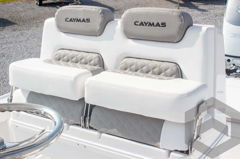 Slide: The Image of 2025 Caymas 26 HB boat seats with gray and white upholstery. - 41