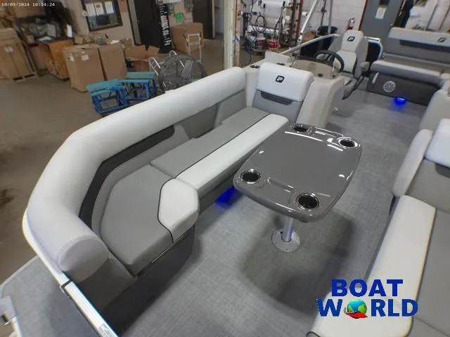 Slide: The Image of 2025 Princecraft Vectra 23 RL pontoon interior with lounge seating and table at Boat World. - 10
