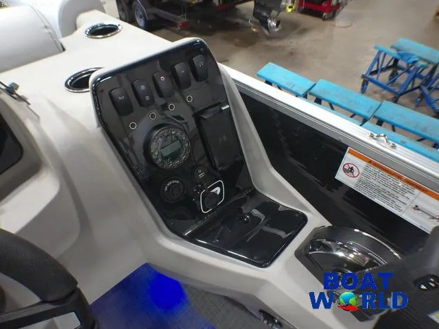Slide: The Image of 2025 Princecraft Vectra 23 RL pontoon boat dashboard with controls and gauges. - 16