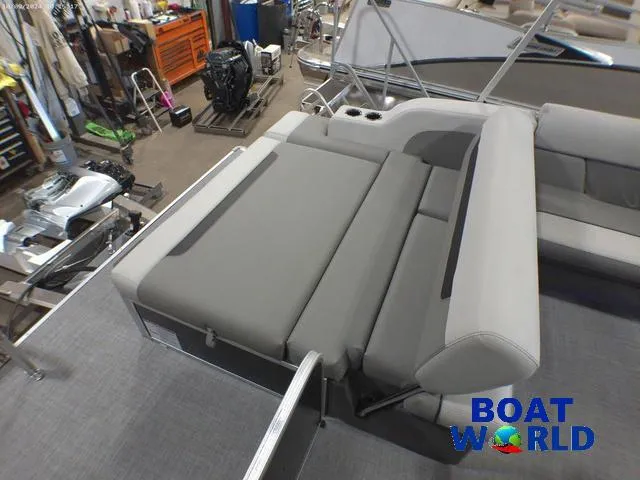 Slide: The Image of 2025 Princecraft Vectra 23 RL pontoon with swingback lounge in a showroom. - 18