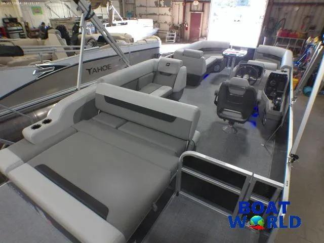Slide: The Image of 2025 Princecraft Vectra 23 RL pontoon with Mercury engine, spacious seating, and modern design. - 20