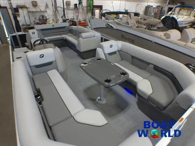 Slide: The Image of 2025 Princecraft Vectra 23 RL pontoon boat interior with lounge seating and table. - 30
