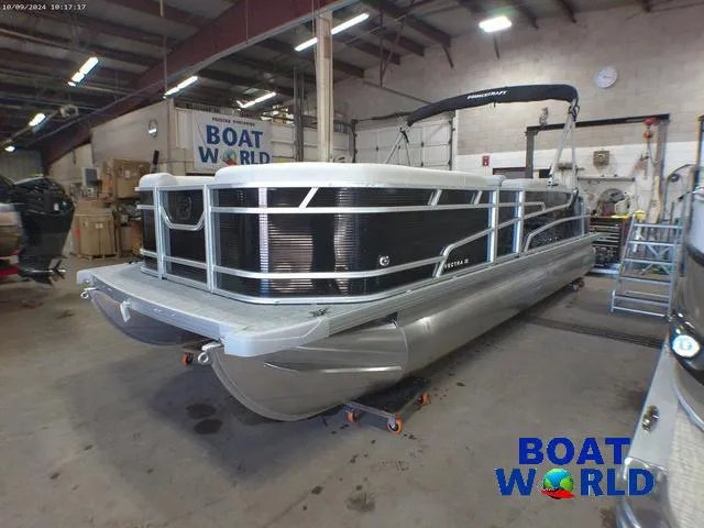 Slide: The Image of 2025 Princecraft Vectra 23 RL pontoon boat in showroom, featuring sleek design and Mercury engine. - 33