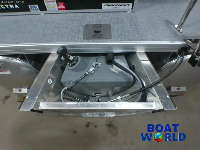 Slide: The Image of 2025 Princecraft Vectra 23 RL pontoon boat fuel compartment, featuring Mercury engine connections. - 36