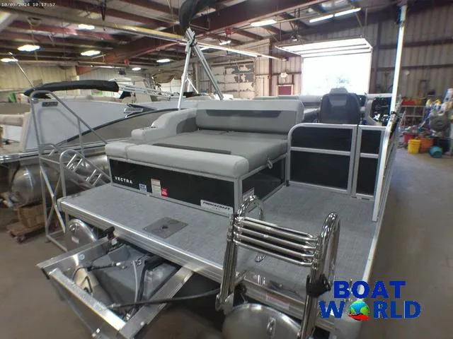 Slide: The Image of 2025 Princecraft Vectra 23 RL pontoon with Mercury engine in a showroom. - 38