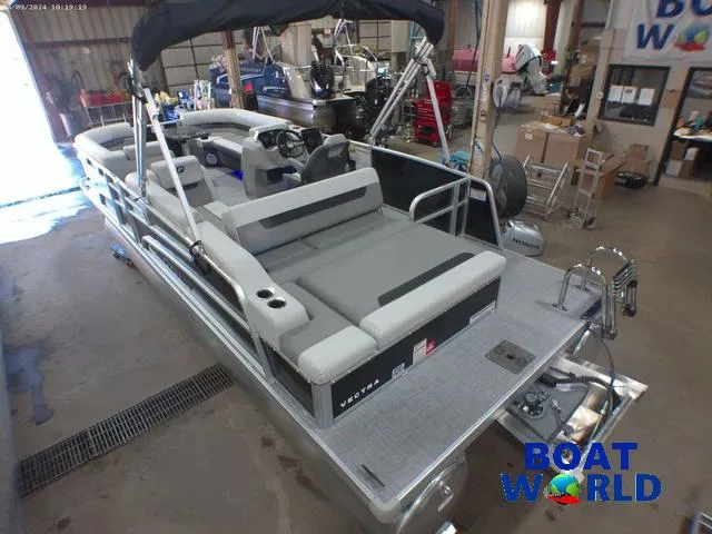 Slide: The Image of 2025 Princecraft Vectra 23 RL pontoon boat with Mercury engine in showroom. - 41