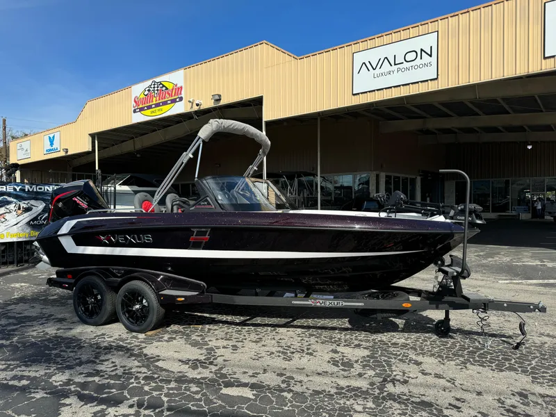 The Image of 2025 Vexus DVX20S boat on trailer outside dealership. - 0