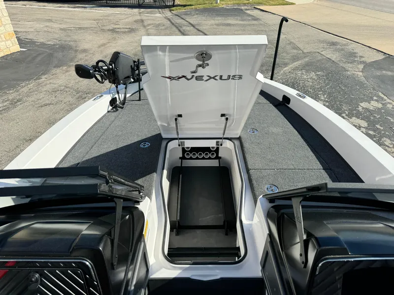 Slide: The Image of 2025 Vexus DVX20S boat interior with open storage compartments. - 18