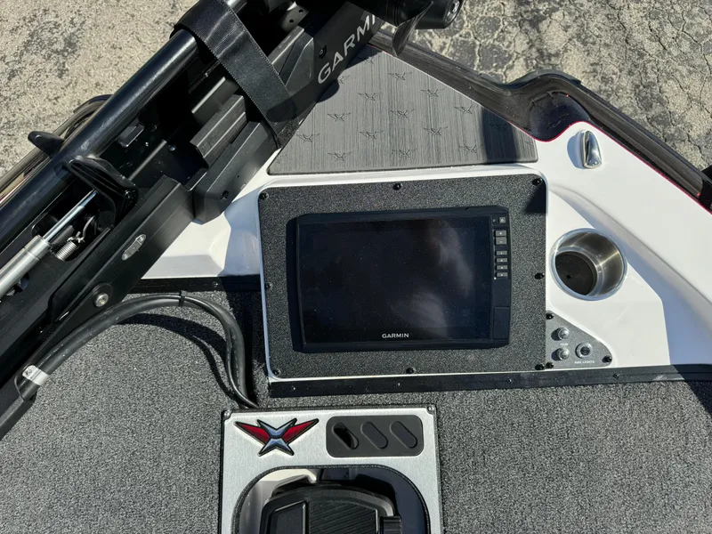 Slide: The Image of 2025 Vexus DVX20S boat dashboard with Garmin display and controls. - 23