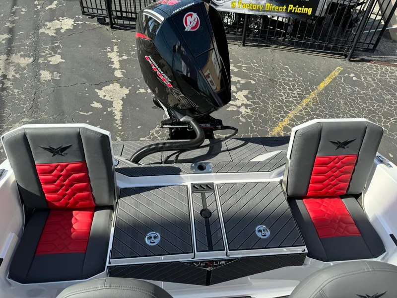 Slide: The Image of 2025 Vexus DVX20S boat with red and black seating, powerful outboard motor. - 32
