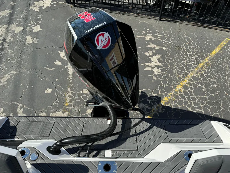 Slide: The Image of 2025 Vexus DVX20S boat with Mercury outboard motor in parking lot. - 36