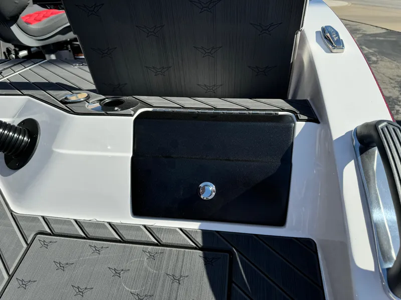 Slide: The Image of 2025 Vexus DVX20S boat interior with storage compartment and seating detail. - 38