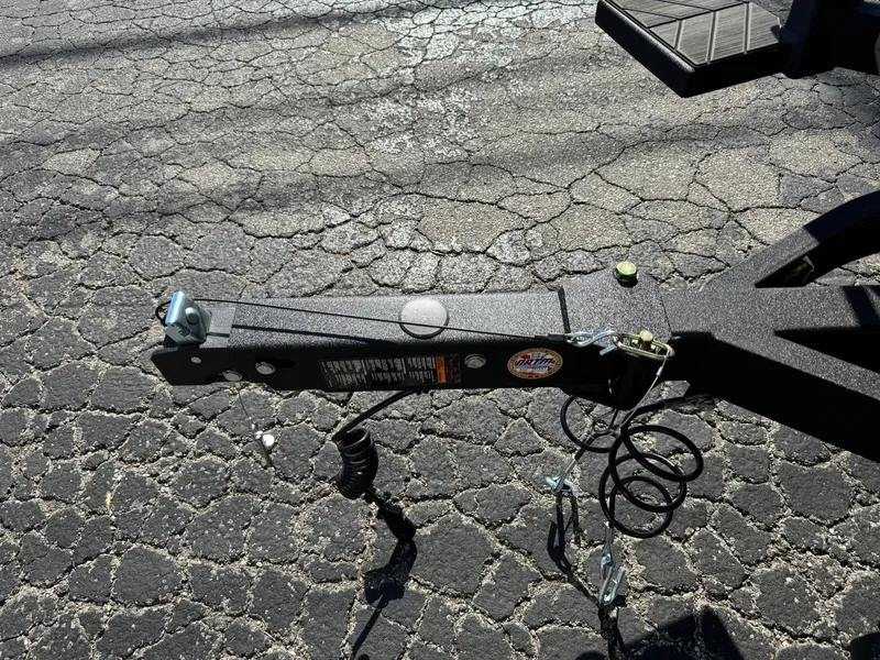Slide: The Image of Trailer hitch of 2025 Vexus DVX20S on textured pavement. - 41