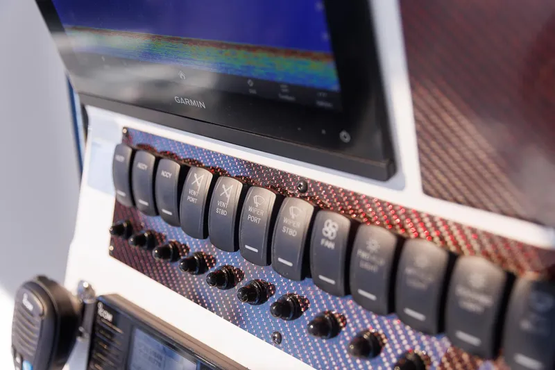 Slide: The Image of Control panel of 2025 Solara S-310 CW with Garmin display and switches. - 28