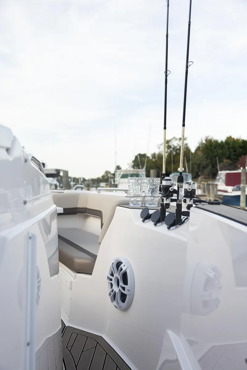 Slide: The Image of 2025 Solara S-310 CW boat with fishing rods and seating area. - 30
