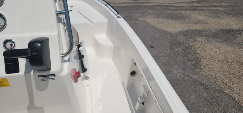 Slide: The Image of 2024 Key West 1720CC boat interior with control panel and steering wheel. - 28