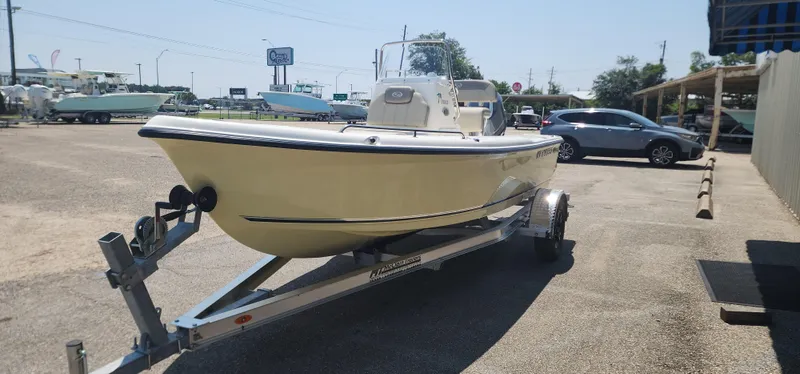 Slide: The Image of 2024 Key West 1720CC boat on trailer in parking lot. - 6