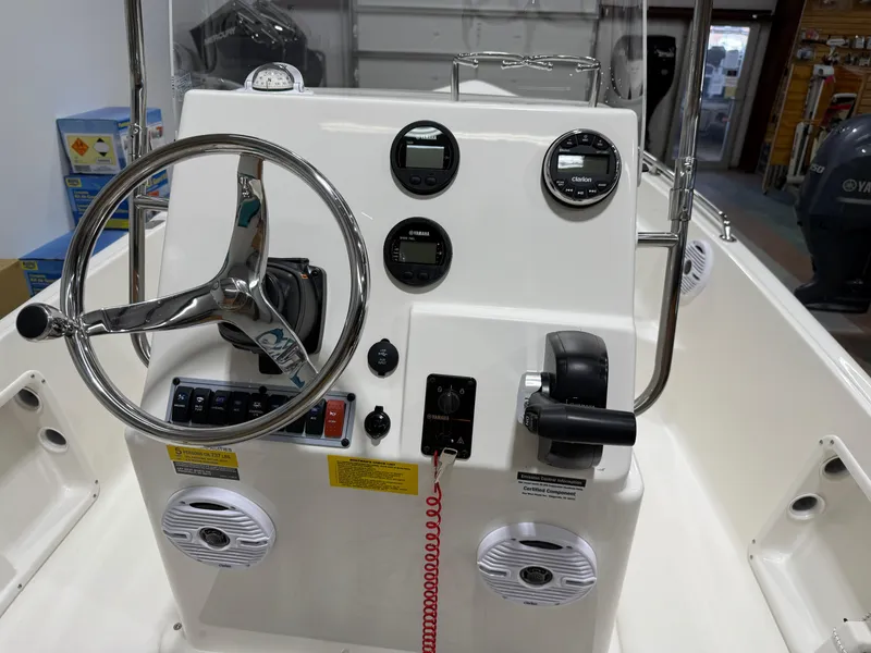 Slide: The Image of 2025 Key West 1720CC boat console with steering wheel and control panel. - 15
