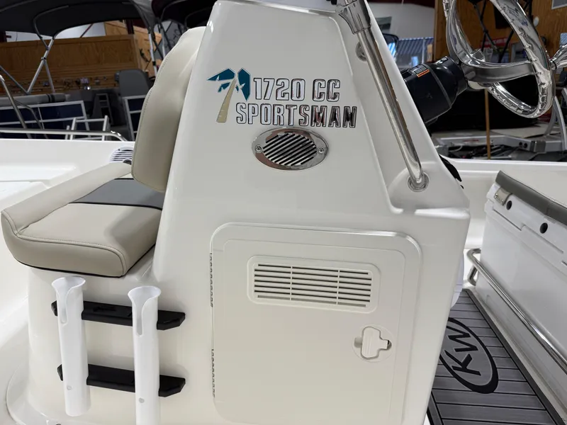 Slide: The Image of 2025 Key West 1720CC Sportsman boat console with seating and steering wheel. - 27