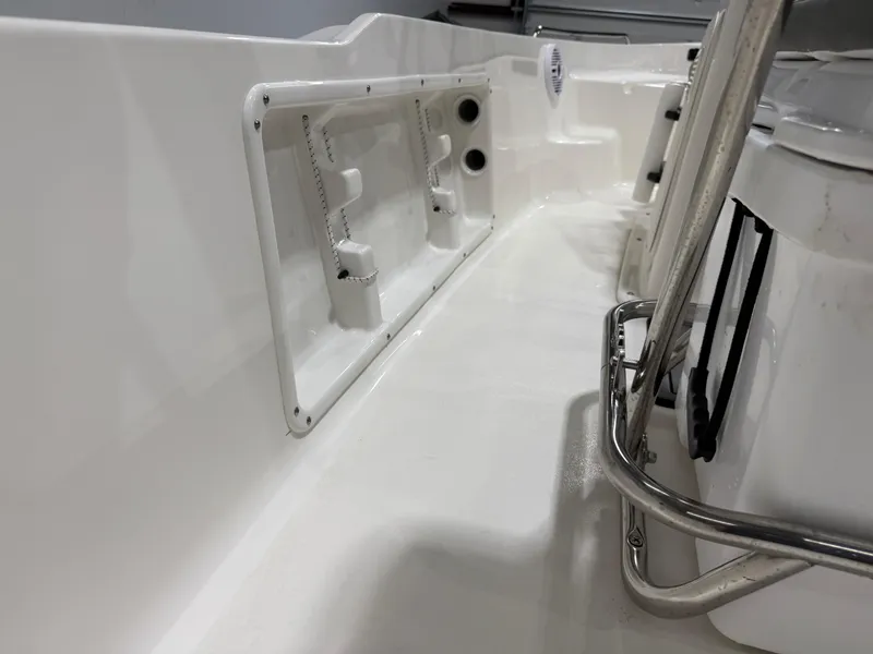 Slide: The Image of 2025 Key West 1720CC boat interior, featuring sleek white design and stainless steel fittings. - 31