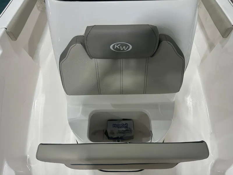 Slide: The Image of 2024 Key West 189FS boat seat with KW logo, gray upholstery. - 29