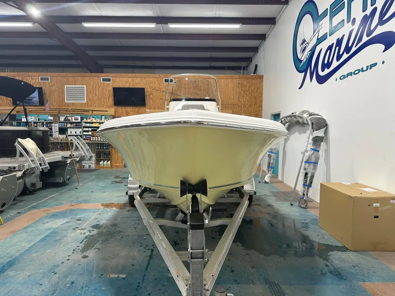 Slide: The Image of 2024 Key West 189FS boat on trailer in showroom, Ocean Marine Group. - 5