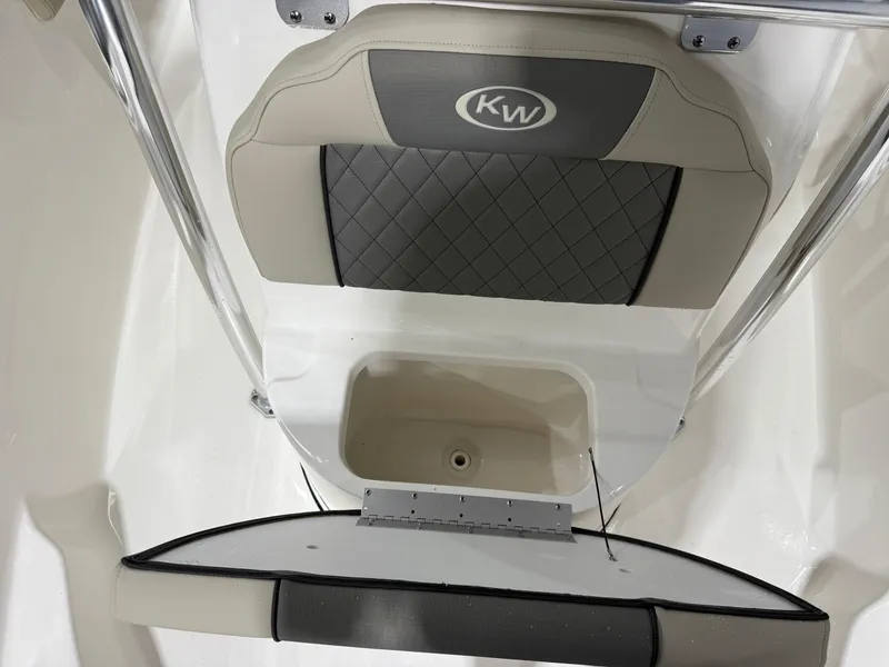 Slide: The Image of 2025 Key West 189FS boat seat with storage compartment, featuring KW logo. - 21