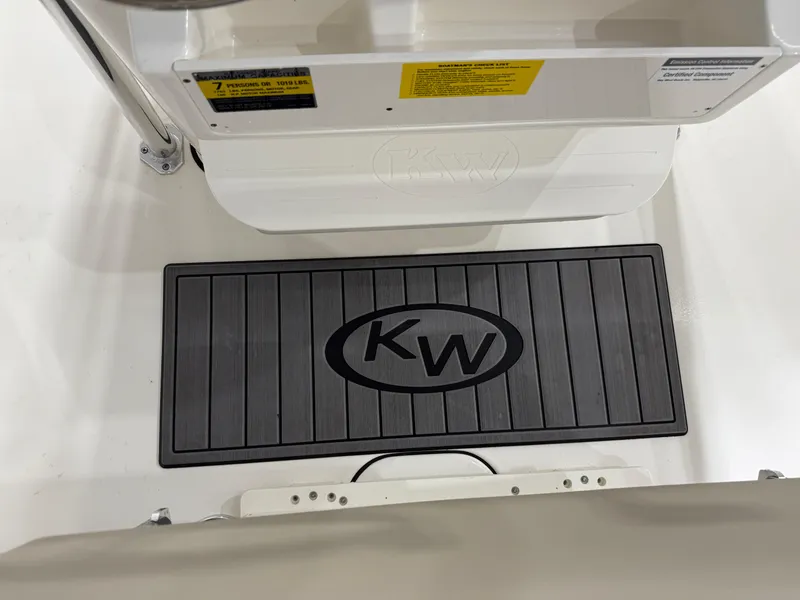 Slide: The Image of 2025 Key West 189FS boat interior with KW logo mat. - 24