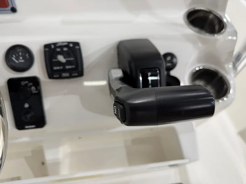 Slide: The Image of Close-up of 2025 Key West 189FS boat control panel and throttle. - 28