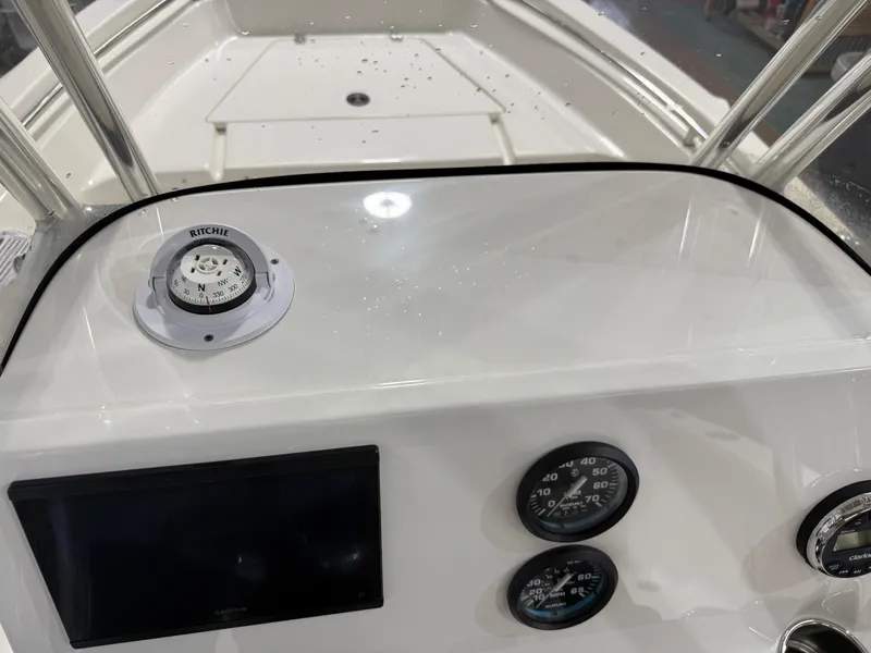 Slide: The Image of 2025 Key West 189FS boat dashboard with compass and gauges. - 30