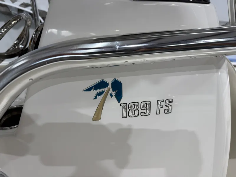 Slide: The Image of 2025 Key West 189FS boat logo with chrome railing detail. - 39