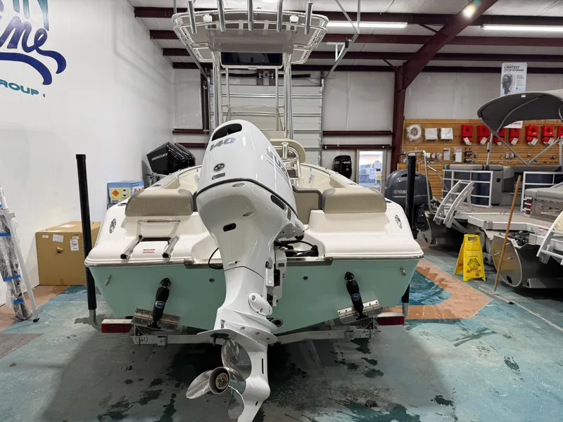 Slide: The Image of 2025 Key West 189FS boat in showroom with Yamaha outboard motor. - 6