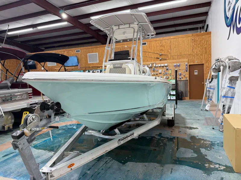 Slide: The Image of 2025 Key West 189FS boat on trailer in showroom. - 8