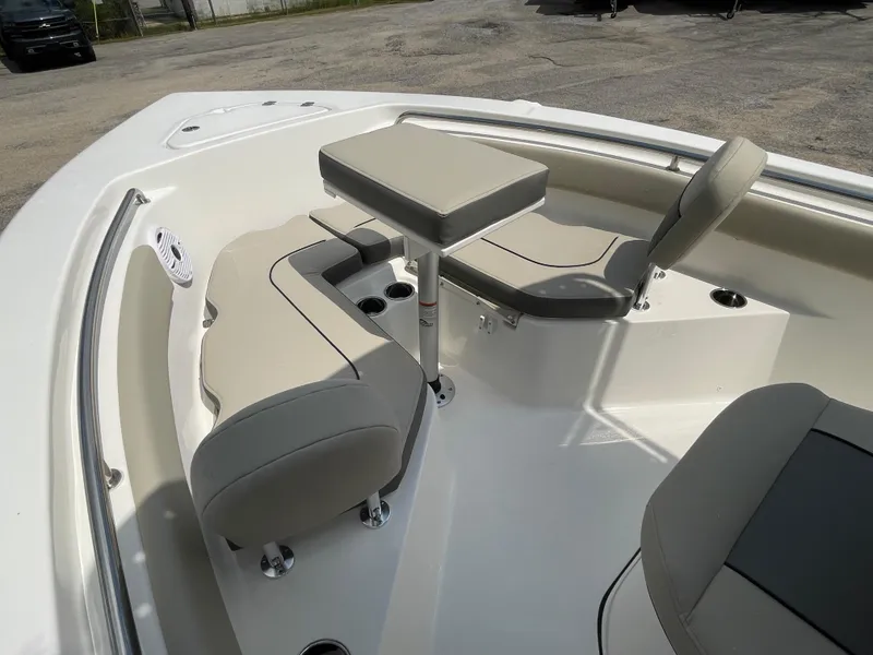 Slide: The Image of 2025 Key West 203FS boat interior with seating and table, showcasing modern design. - 18