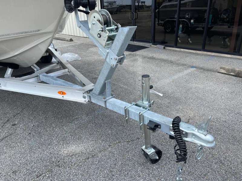 Slide: The Image of Trailer hitch of 2025 Key West 203FS boat on pavement. - 39