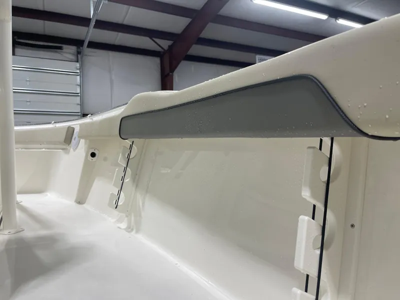 Slide: The Image of Interior view of 2025 Key West 219fs boat in a garage setting. - 19