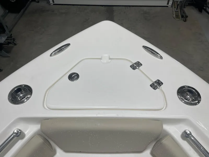 Slide: The Image of Bow of 2025 Key West 219fs boat with storage hatch and seating. - 33