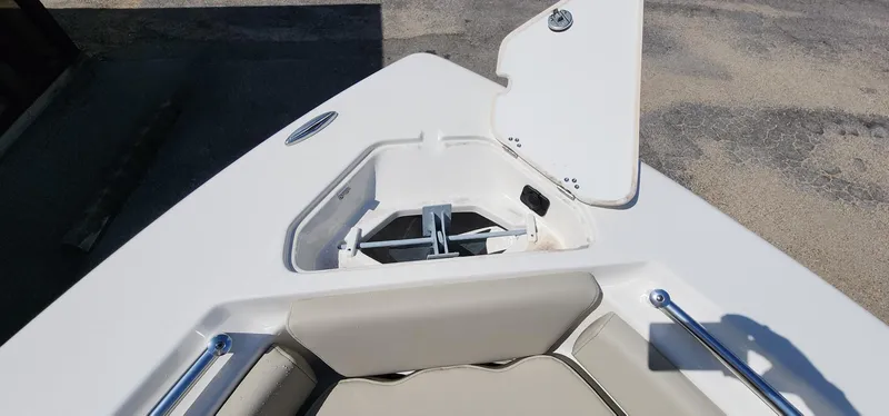 Slide: The Image of 2024 Key West 219fs boat anchor compartment with open hatch. - 37