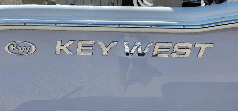 Slide: The Image of 2024 Key West 219fs boat logo on side panel. - 5