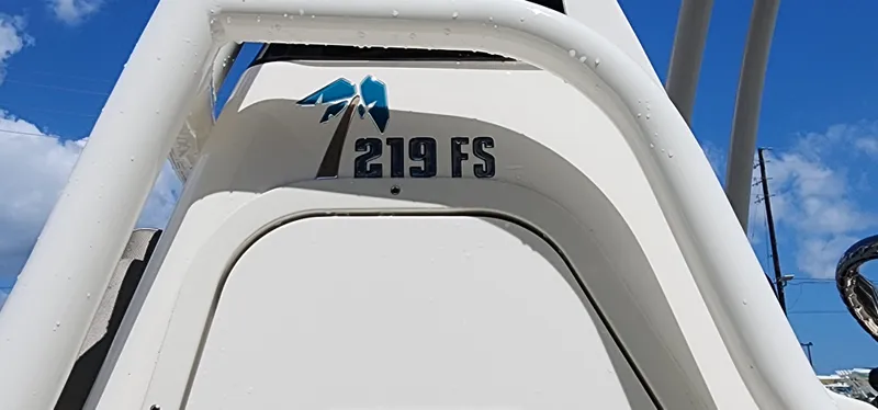 Slide: The Image of 2024 Key West 219FS boat detail against blue sky background. - 9
