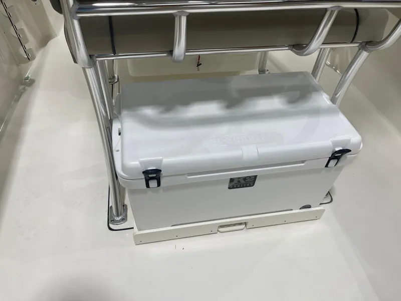 Slide: The Image of 2024 Key West 244CC boat interior with white cooler and stainless steel frame. - 19