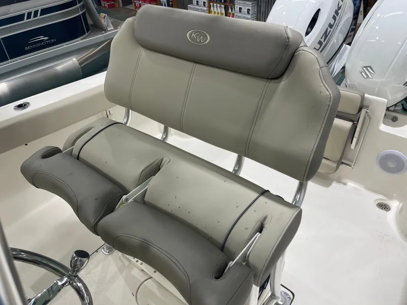 Slide: The Image of 2024 Key West 244CC boat seat with gray upholstery and sturdy design. - 21