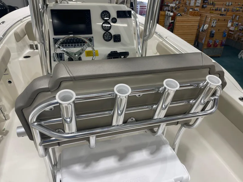 Slide: The Image of 2024 Key West 244CC boat console with rod holders and navigation equipment. - 47