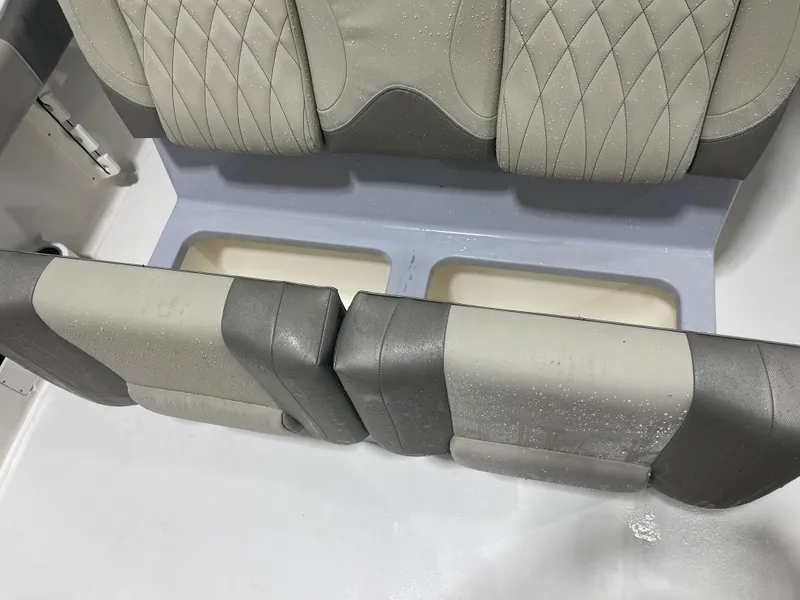 Slide: The Image of 2024 Key West 291FS boat seat with storage compartments, wet upholstery. - 35