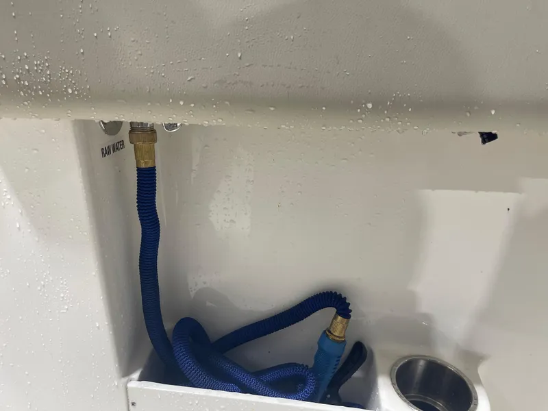 Slide: The Image of 2024 Key West 291FS boat raw water hose and connection detail. - 41